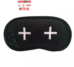 Schwarze Maske mit Papierhauskreuzen