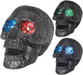 Calavera con luz en los Ojos en colores surtidos 14 cm
