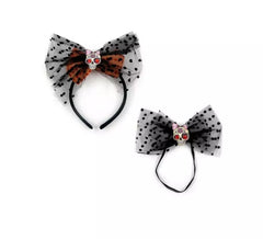Diadem und Fliege mit Totenkopf und Punkten