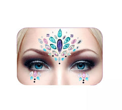 Gesichtsjuwelen leuchtend blaue und lila Tropfen