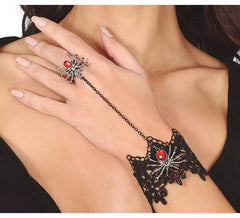 Gesticktes Armband und Spinnenring